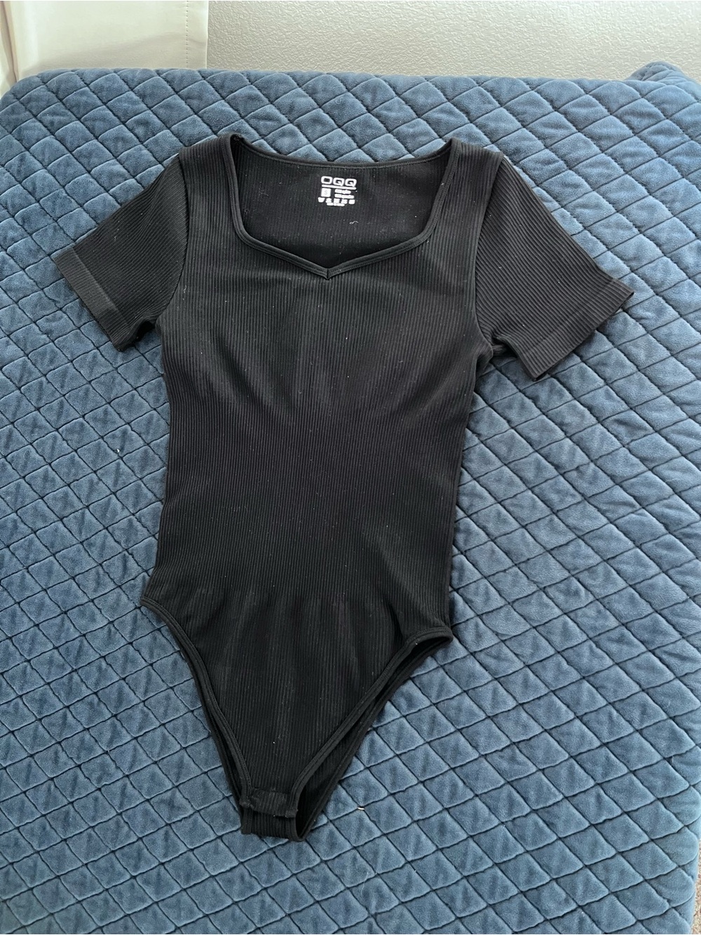 OQQ Black Ribbed Short-Sleeve Bodysuit Women’s Small Casual Fitted Modern Top